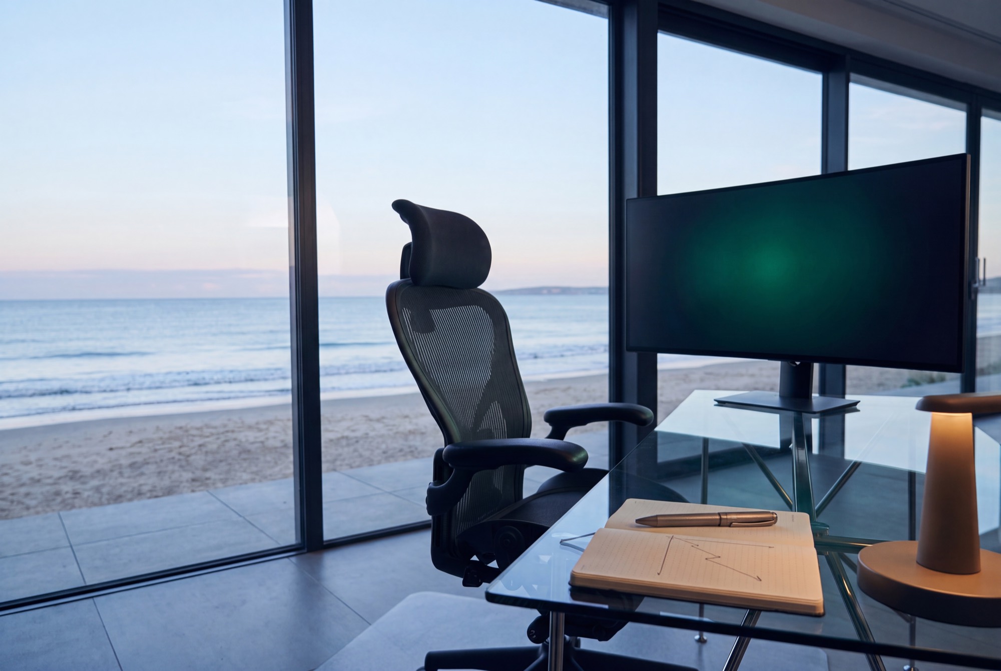 A quiet trading desk before the market opens, dark monitors with a faint green glow in pre-dawn light